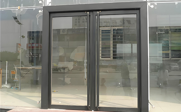 金塔玻璃地弹门