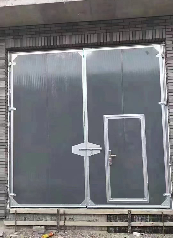 金塔工业平开门在大型设备制造车间的应用实例 金塔工业平开门在大型设备制造车间的应用实例